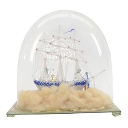 Victorian glass frigger of a three mast ship and a smaller ship under a glass dome, H38cm