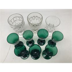 Seven 19th century green wine glasses, together with a rummer glass, the funnel bowl upon thick circular spreading foot with facet-cut decoration, and two moulded glasses, one with Victorian lozenge beneath