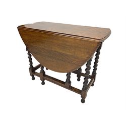 20th century oak drop-leaf dining table on spiral turned supports 