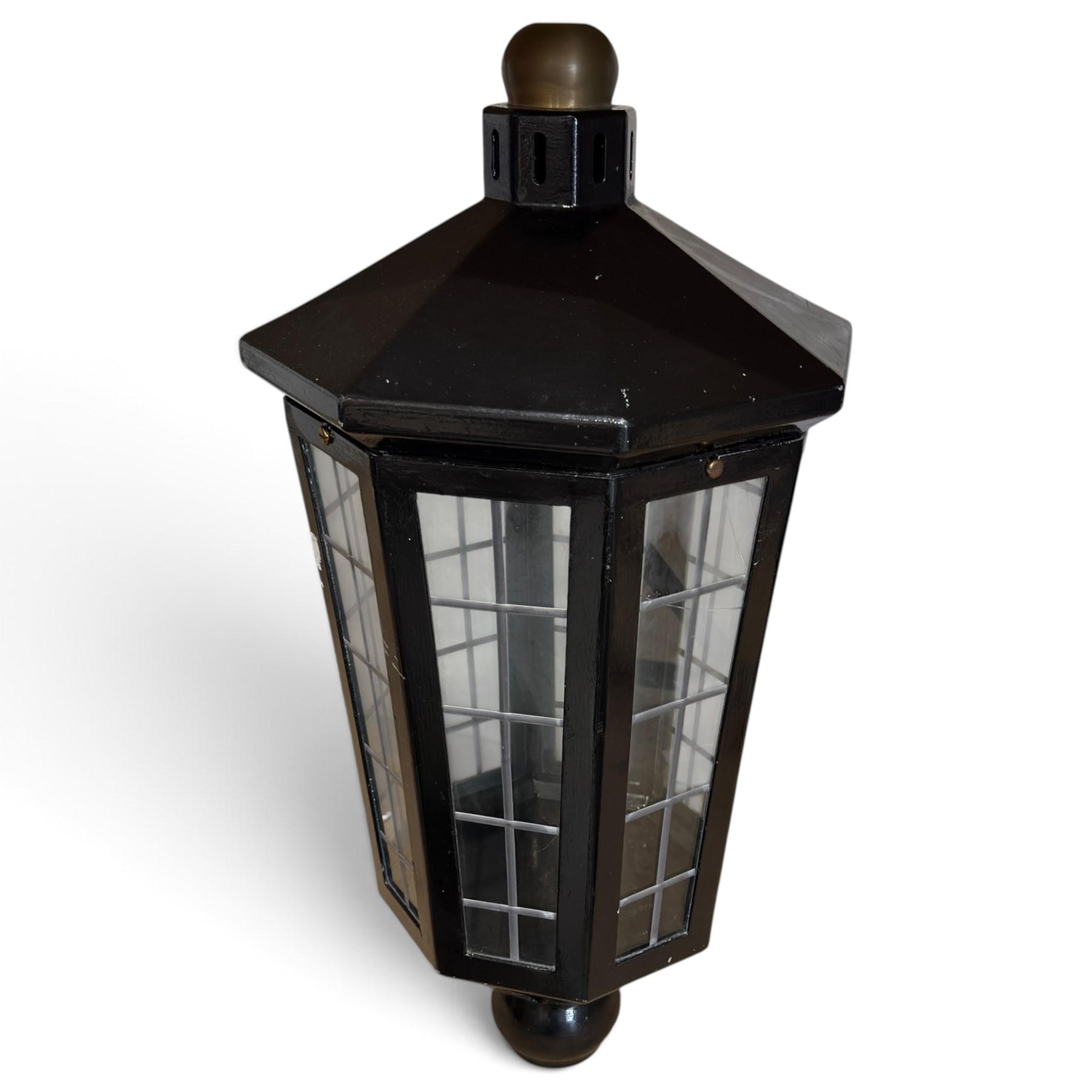 Georgian design black-painted metal octagonal hanging lantern, with brass ball finial above a hipped canopy, astragal glazed lattice panels and pendant ball terminal