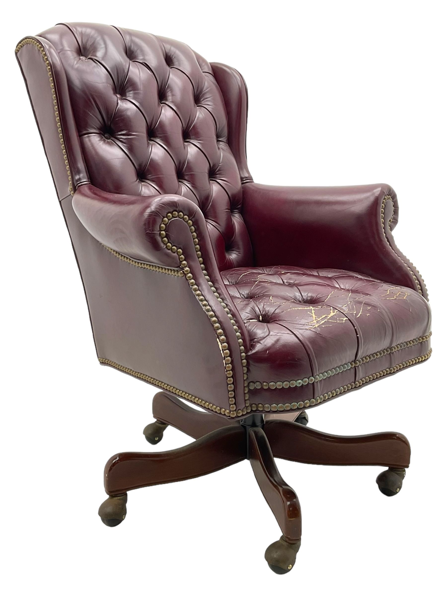 Hancock & Moore - swivel office desk chair, upholstered in buttoned burgundy leather with studded bands, five-spoke base on castors