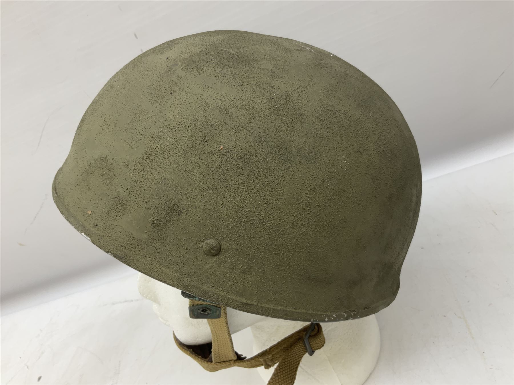 Post-WW2 British Airborne Troops,/Paratroopers Steel Helmet with green textured paint finish, leather and sponge liner and three point chinstrap mounting; liner marked BMB II 1953 71/4