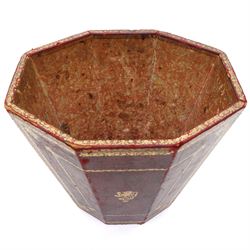 Regency style burgundy leather waste paper bucket of tapering octagonal form with gilt-tooled borders, sides fitted with lion mask ring handles, interior lined with marbled paper, circa 1900
