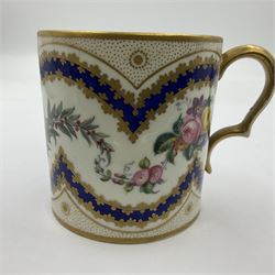 Sèvres soft paste porcelain coffee can and saucer with date code for 1767, painted with floral and laurel leaf garlands within blue scalloped and gilt borders, interlaced LL monogram enclosing the date letter O above painters mark for Catrice, coffee can H7.5cm, saucer D15cm