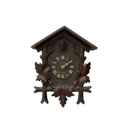 19th century child's rocking chair; heavily carved cuckoo clock; canal buckby can hand painted with floral motifs (3)