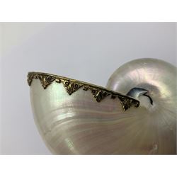 Modern limited edition silver mounted nautilus shell cup, no. 42/150, the pearlescent shell cup with silver-gilt strapwork to rim, upon a stem modelled as a putto supporting a gilt cornucopia and circular domed foot depicting Poseidon amongst swirling waves, hallmarked by St James House Company, London 1980,  H17.5cm