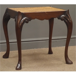  Georgian style walnut bergere rectangular stool, cane work seat with shaped rails, on scroll carved cabriole supports, W54cm  