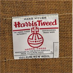 Tetrad - 'Taransay' Harris Tweed and tan leather club armchair, Howard shape with reclined back over deep seat and rolled arms with studwork, raised on turned front supports with castors, the sides and arms upholstered in tan leather with seat and back in herringbone-stitched Harris Tweed