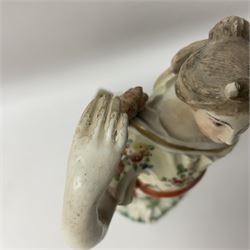 18th century Derby figure of Diana the huntress, circa 1760, modelled reaching for an arrow from quiver across her back, with recumbent hound at her feet, upon a scrolled base with bocage detail, H27.5cm