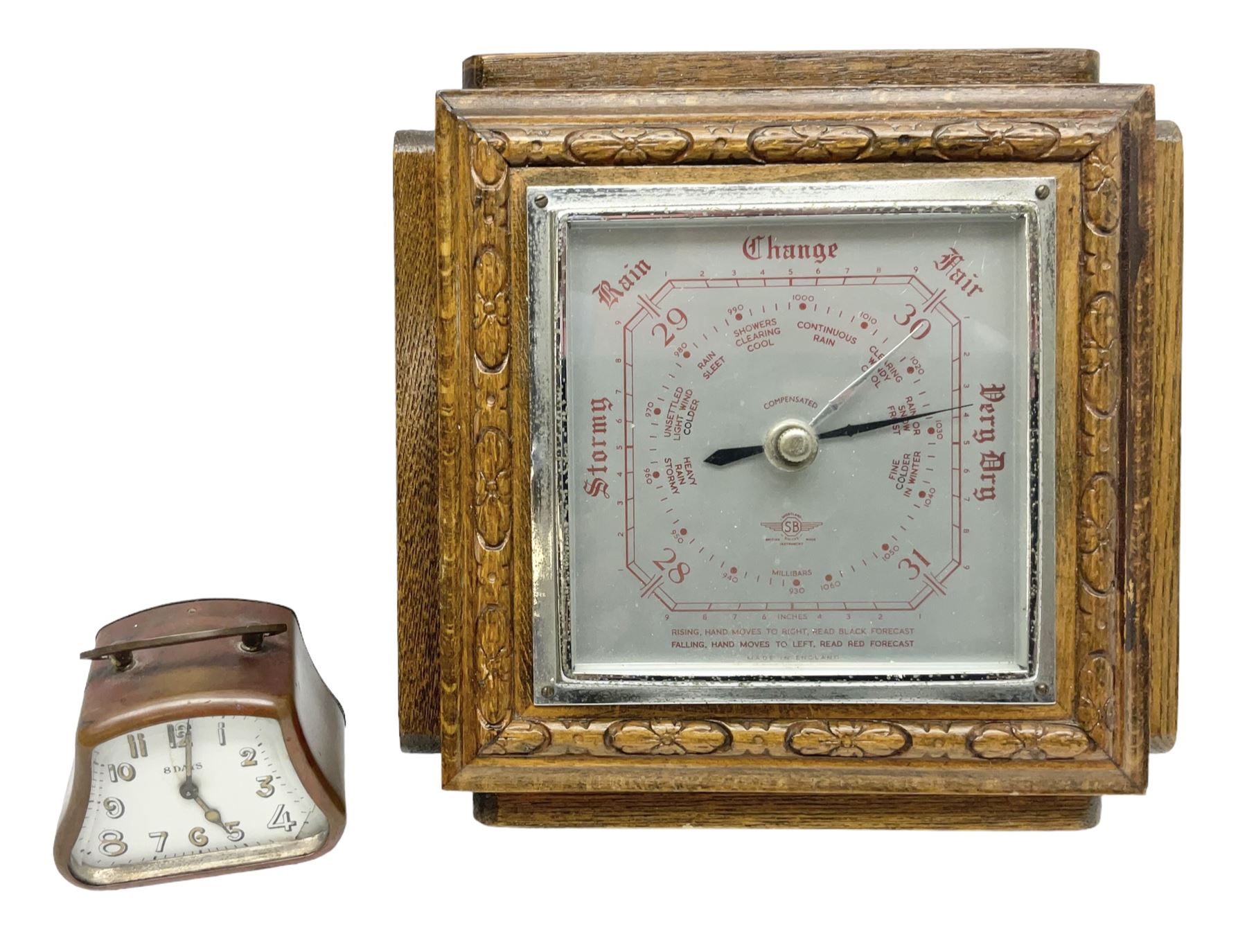 Smiths barometer in carved and stepped oak square case, together with a small copper 8 days clock with bevelled glass plate