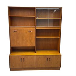 G-Plan - mid-20th century teak modular wall cabinet, fitted with shelves, display cabinet, fall front compartment and two double cupboards