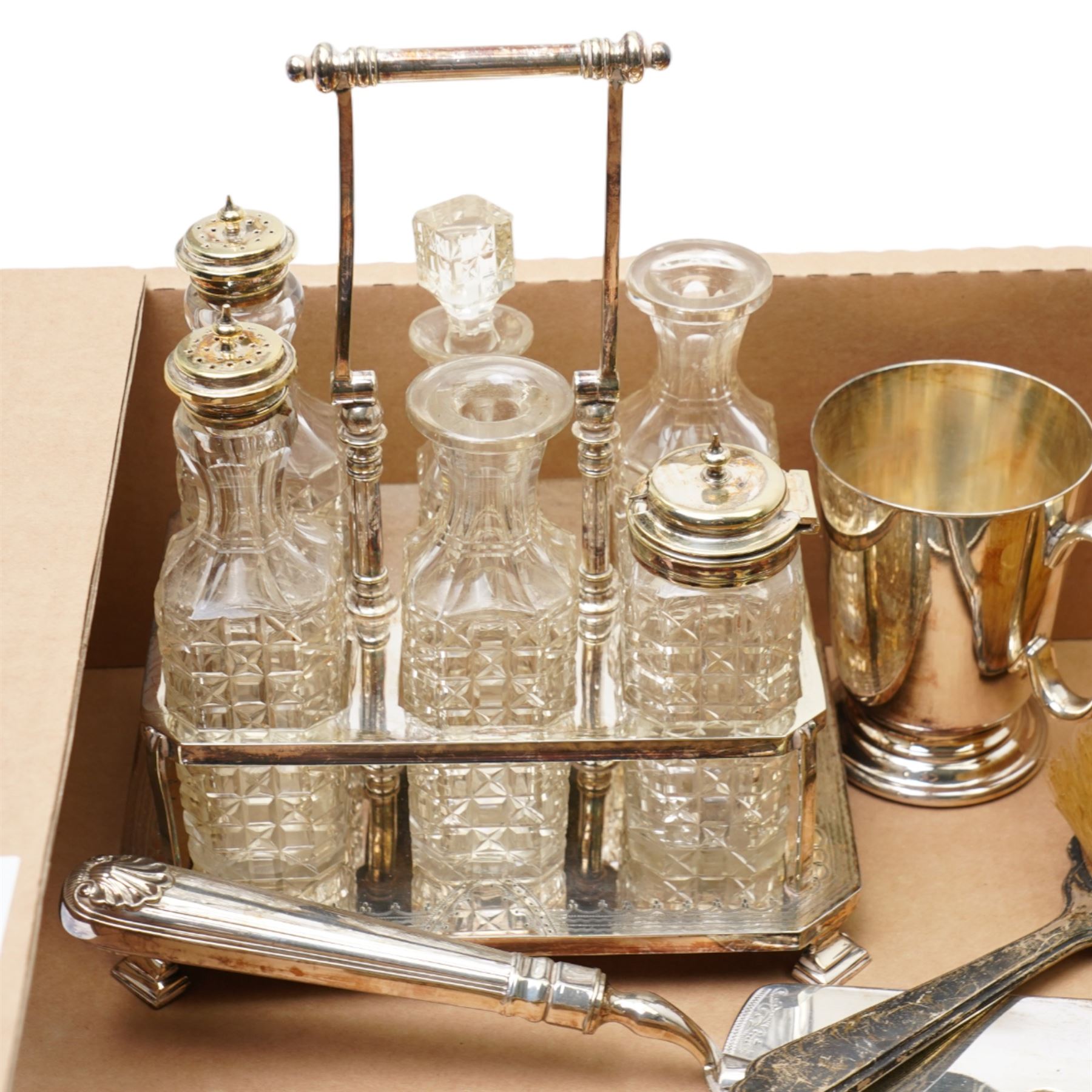 Silver backed brushes and mirrors,plated six bottle cruet, crumb scoop, tankard, plated frame and chromium dish