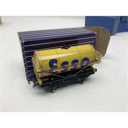 Hornby Dublo - nineteen goods wagons comprising 32040 Goods Van D1 (SR) in LMS stickered box, DR375 Goods Van D1 (GW), D303 Open Goods Wagon D1 (GW), 32044, 32076, 32052, 32021, 32074, 32056, 32065, DR379, 32070, 32020, DR373, two x 32075, High Sided Wagon D2 (LMS) in NE stickered box; all boxed; Tank Wagon D1 (Esso) and DR380 Meat Van D1; both in later unassociated boxes (19)