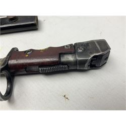 British No 7 MKI knife bayonet with 20cm single edged fullered clipped point blade;  blackened steel, large muzzle ring cross-guard; blackened swivelling pommel marked 'F5H'; red Tufnol composite grips; in blackened steel scabbard L33cm overall; British Pattern 1888 bayonet with scabbard; and German Ersatz bayonet with scabbard (3)