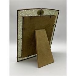 Early 20th century Chinese jade mounted photograph frame, of rectangular form the pierced jade frame carved with flowers and birds, the top panel carved with Foo dogs flaking an applied carved lavender coloured boss, with easel support verso, H33cm
