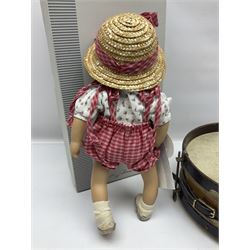 German Gotz articulated vinyl baby doll 'Claire' c1997 with original clothing, hat and labels; artist designed by Sylvia Natterer H35cm; boxed; and small child's wooden cased drum (2)