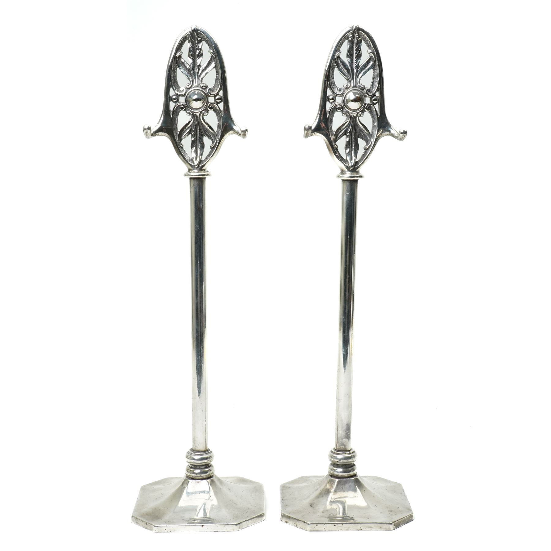 Pair of silver plated companion stands with pierced oval finials on square bases H53cm
