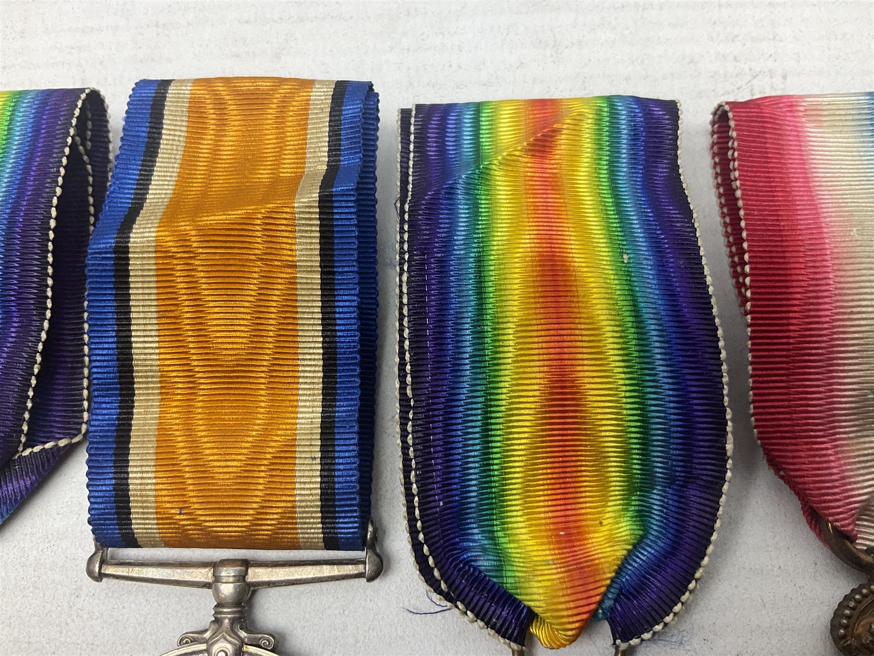 Family group of five WW1 medals for the East Yorkshire regiment comprising trio of 1914-15 Star, British War Medal and Victory medal awarded to 13-368 Pte. C. Padget; and British War Medal and Victory Medal to 201829 Pte. H.W. Padget; all with ribbons (5)