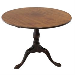 19th century quality mahogany tripod table, the circular tilt top supported on a turned ba...