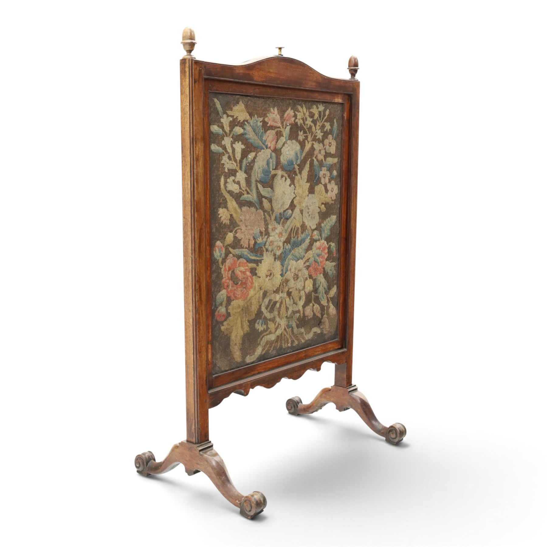 Georgian carved mahogany firescreen, the extending panel with Georgian needlepoint tapestry to one side and Arts & Crafts style machine tapestry to the opposing, on splayed supports with scroll feet
