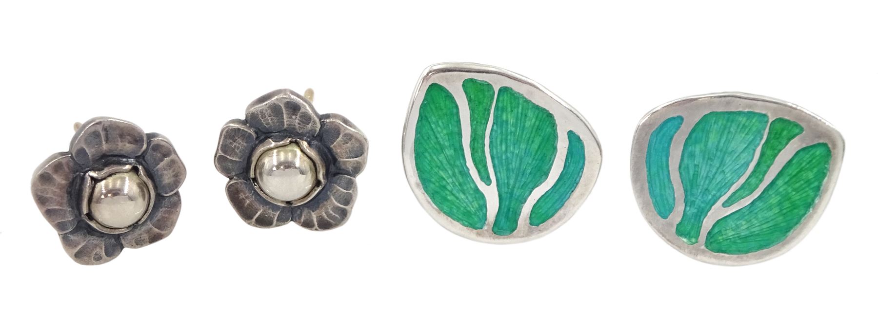 Pair of  silver flowerhead stud earrings by Georg Jensen No. 2002 and pair of Glazzard Lundsten silver enamel stud earrings