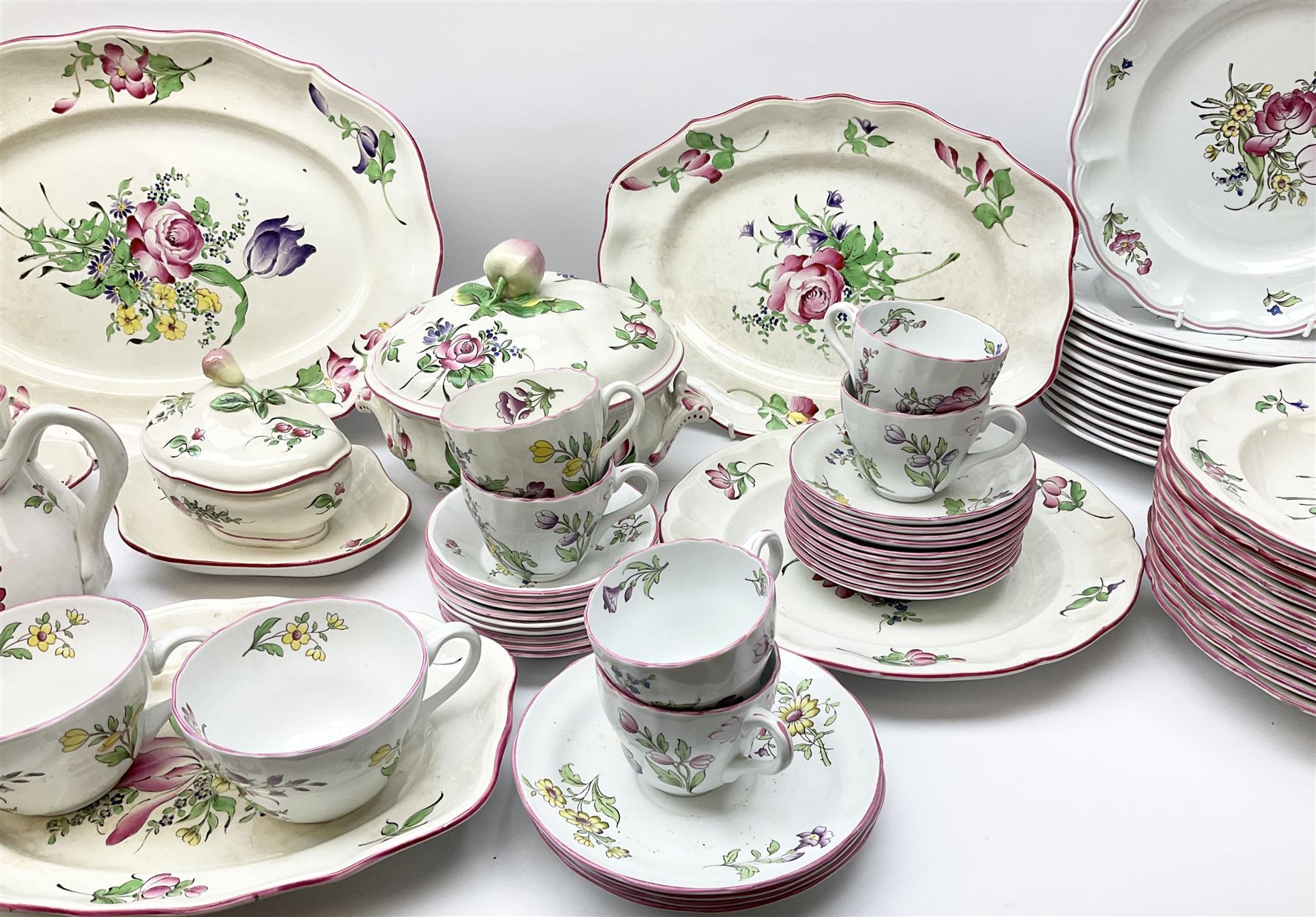 Matched Copeland Spode, Spode and French Luneville and Marlborough Sprays pattern dinner and tea wares, comprising two tureen and covers and apple finials, two sauce tureen and covers with pear finials and fixed stands, six graduated platters including two pairs, large plate, thirteen dinner plates, twelve bowls, ten smaller bowls, eight side plates, eleven smaller side plates, teapot, twin handled sucrier and cover with apple finial, open sucrier, cream jug, smaller cream jug, four breakfast cups, eight tea cups, four large saucers, eleven smaller saucers, and nine further smaller saucers. 
