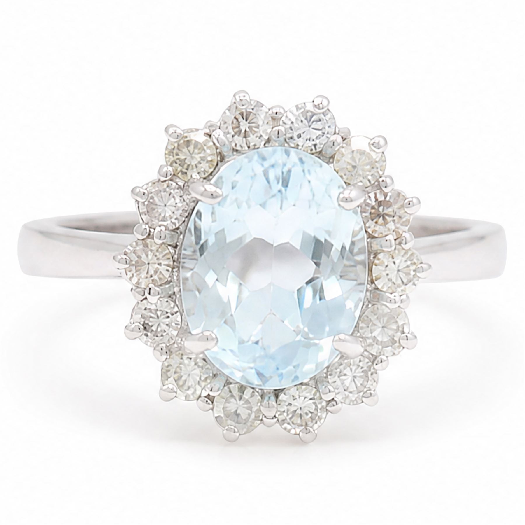 18ct white gold aquamarine and diamond cluster ring, single oval cut aquamarine of approx 2.80 carat, surrounded by fourteen round brilliant cut diamonds, hallmarked, total diamond weight approx 0.60 carat