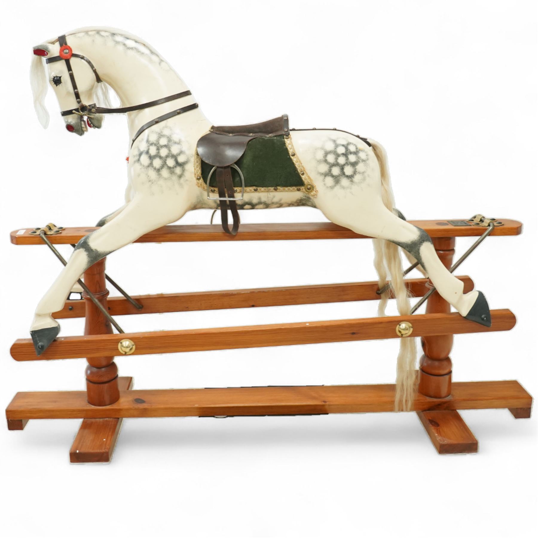 Antony Shackleton of Snainton - 1997 rocking horse titled ‘Fred’, the painted dapple grey body with real horsehair mane and tail, green velvet saddle cloth and leather tack, mounted on a pine swing stand with brass fittings
