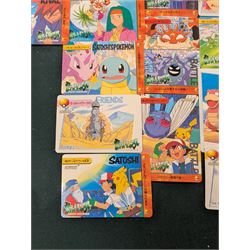 Collection of Pokemon TGC trading cards, including two WB First Movie Black Star promo cards Pikachu no. 4 and Dragonite no. 5, two Ancient Mew Black Star holo promo cards, Gym Challenge Giovanni's Persian 8/132 holo and a small collection WOTC, Neo Discovery and Neo Genesis cards, together with thirty four Bandai Carddass Pokemon cards, including prism Charizard no. 186 and Pokemon Topps cards including holo examples 