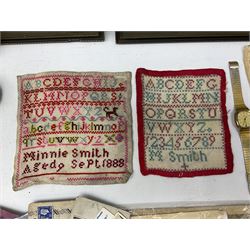 Two 19th Century samplers worked with the alphabet, to include one example by Minnie Smith aged 9 September 1888, two silver plated wine coasters, Timex Quartz watch, set of six mother of pearl handled knives and forks, 1929 season Christie's auction book, other needleworks, postcards, framed prints, seascape oil on board, records and other misc in one box