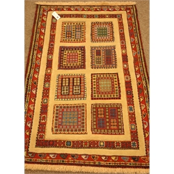  Small Persian rug, geometric design tiles with raised woollen borders, 130cm x 86cm  