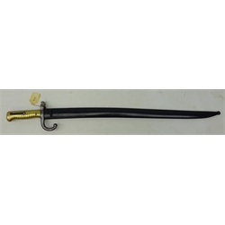  French Sword/Bayonet, 57cm recurved part fullered single edge blade engraved on spine with date 1879, quillion stamped AB 58207, ribbed brass grip, in black scabbard, L71cm  
