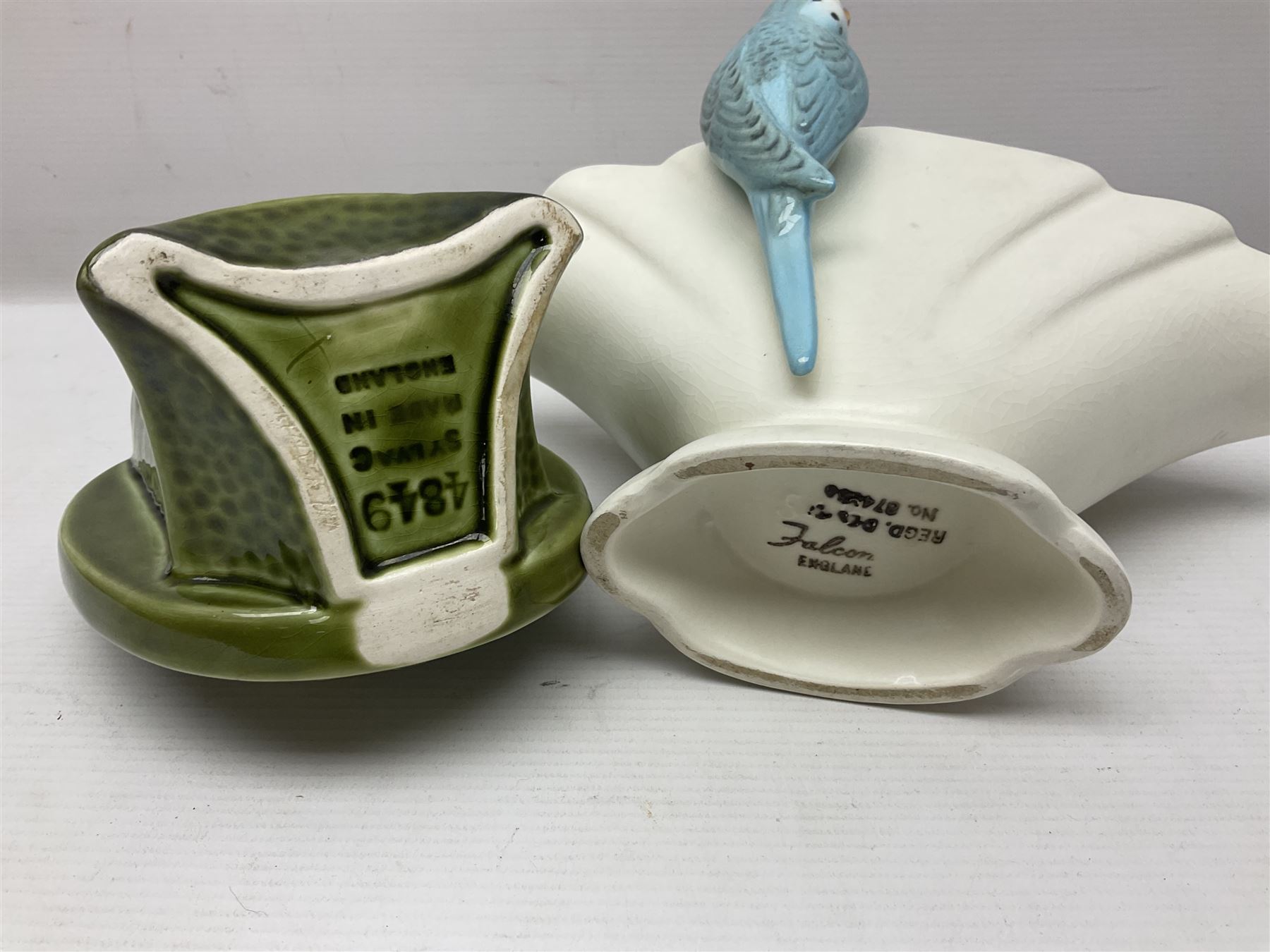 Collection of Sylvac and similar animal figures, including rabbits, hares and dogs, together with Falcon budgie vase, etc 