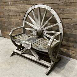 Early 20th century timber framed cartwheel garden bench