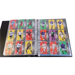 Collection of Football related trading cards, stickers and coins, including 1990 Esso World Cup Coin Collection, an empty 2010 Esso Official England Medal Collection Folder, incomplete 1990 Italy World Cup Commemorative Medal Collection, 1998 The Official England Squad Medal Collection, 1970s Topps All Stars Cards, 1992 Panini Official Football Players cards, Euro 2008 Collectors Binder and Cards, Panini 2009/10 Champions League Stickers, etc housed in four folders