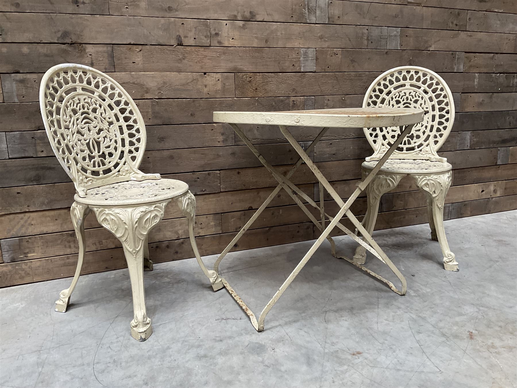 Circular cast aluminium garden table (D74cm, H68cm), and two chairs
