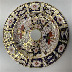 Two Royal Crown Derby Imari plates, decorated in the 1128 pattern, together with Royal Crown Derby seated Cat, without stopper and another Imari plate, largest plate D22cm