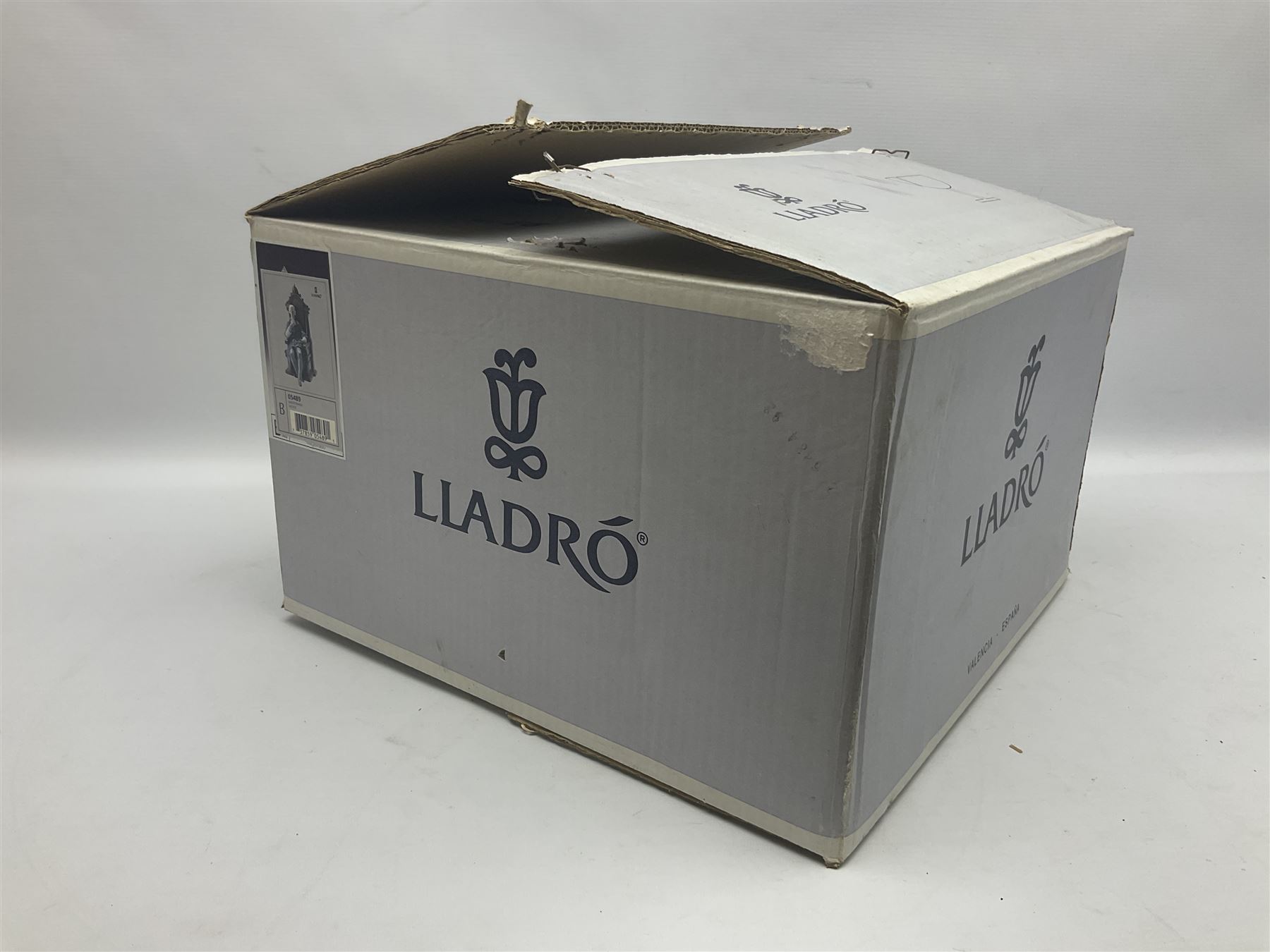 Lladro figure, Justice, modelled as a judge sat in a char, sculpted by Salvador Furió, with original box, no 5489, year issued 1988, year retired 1993, H34cm 