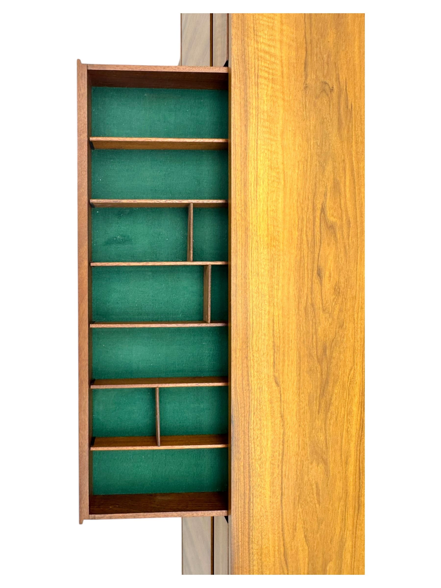 Younger - 1960s teak sideboard, three drawers over three cupboard, centre draw lined with baize with dividers, recessed handles with tapered feet