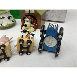 Border Fine Arts Shaun The Sheep Tractor Train and musical figure, together with a Wallace and Gromit photograph frame and a Gromit cruet sett, three in original boxes  