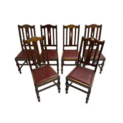 Set six early 20th century oak dining chairs, shaped cresting rail over pierced splat, drop in upholstered seats, on turned supports joined by plain stretchers