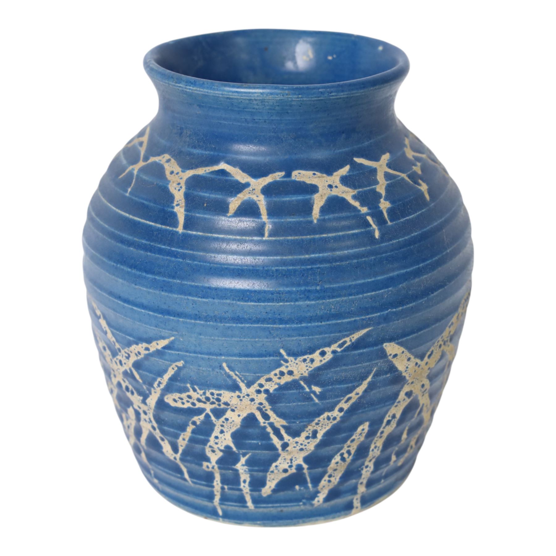 Quentin Bell 1910-1996: ribbed vase with fluted rim, decorated in white abstract design on a blue ground, signed Bell beneath, H16cm 