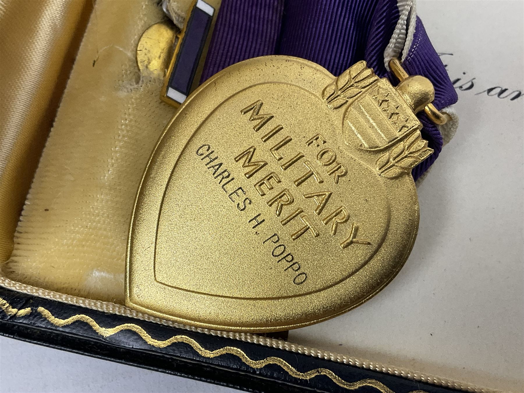 American Purple Heart Medal awarded to 32634848 Charles H. Poppo; cased with identity tags and paperwork; and Bronze Star Medal awarded to U.S. Marine Esteban T. Maranao; cased; American WWII Victory Medal and Asiatic Pacific Campaign Medal