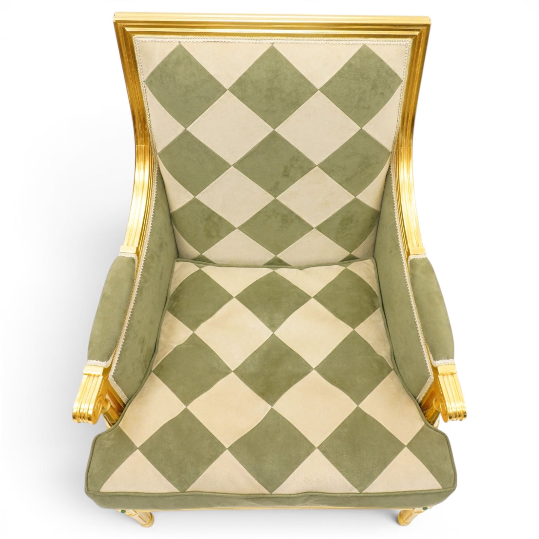 Meritalia - French Empire design gilt framed armchair, the high back over scrolled arm terminals, reeded bottom rail over fluted tapering supports, upholstered in sage green and cream lozenge patterned suede fabric with loose seat cushion
Notes: By vendor's repute originally commissioned in the 1990s by Prince Jefri Bolkiah and the Brunei royal family for use in guest suites.