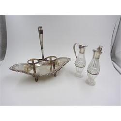  Late Victorian Adams style silver vinegar and oil stand, two silver mounted cut glass bottles on boat shaped stand with gadroon and floral moulded border and central loop handle by Charles Boyton, London 1900 H17.5cm x W22cm   