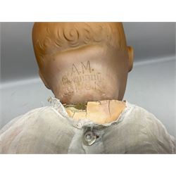 Heubach Koppelsdorf Germany bisque head doll with applied hair, sleeping eyes, open mouth with teeth and composition body with jointed limbs; marked 'Heubach Koppelsdorf 342.6/0 Germany' H34cm; Armand Marseille bisque head baby doll with moulded hair, sleeping eyes, open mouth and composition body with jointed limbs; marked 'A.M. Germany 351./8.K.; and BND London all composition doll (3)