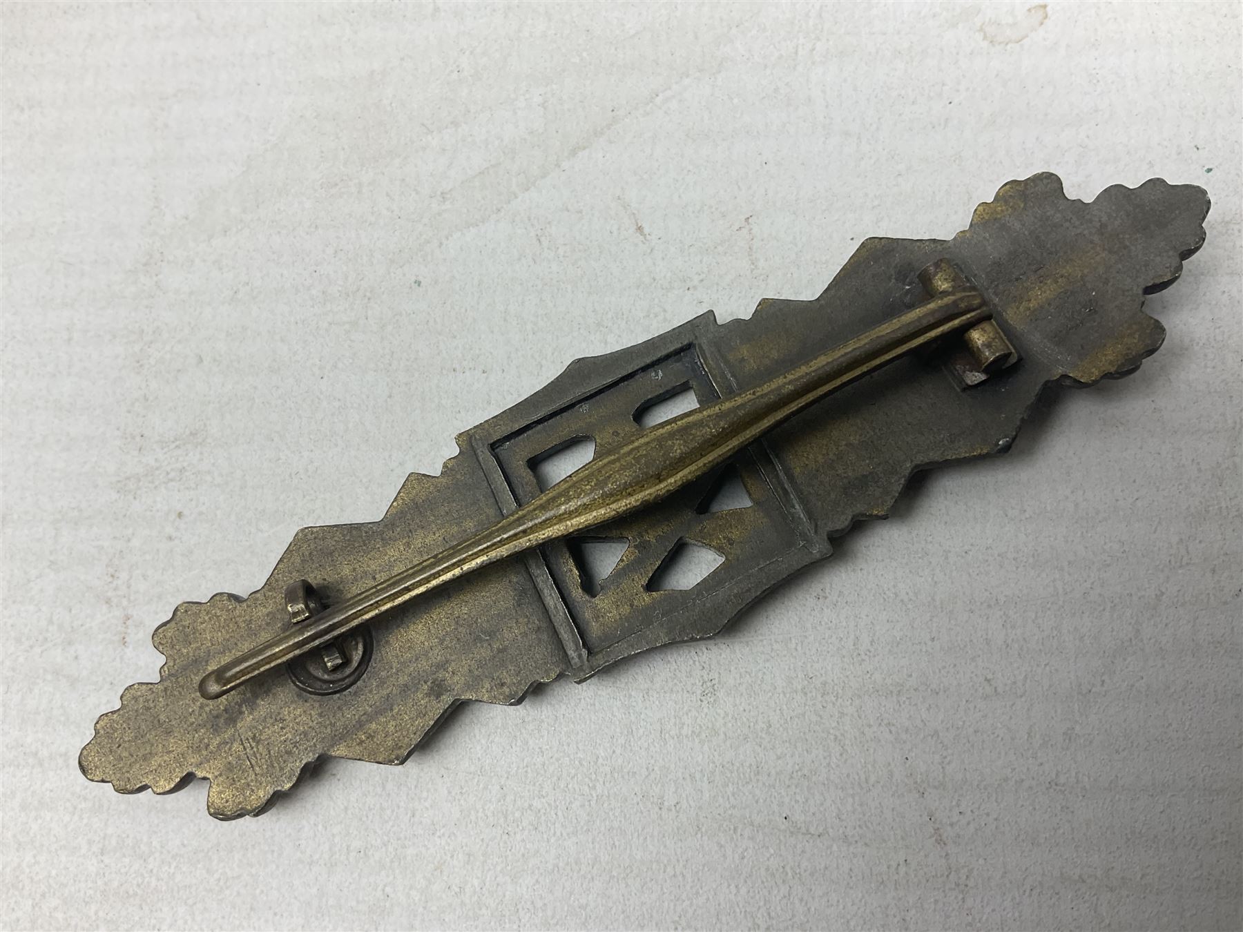 Three WW2 German badges - Close Combat Clasp; Army Flak badge; and Wound badge