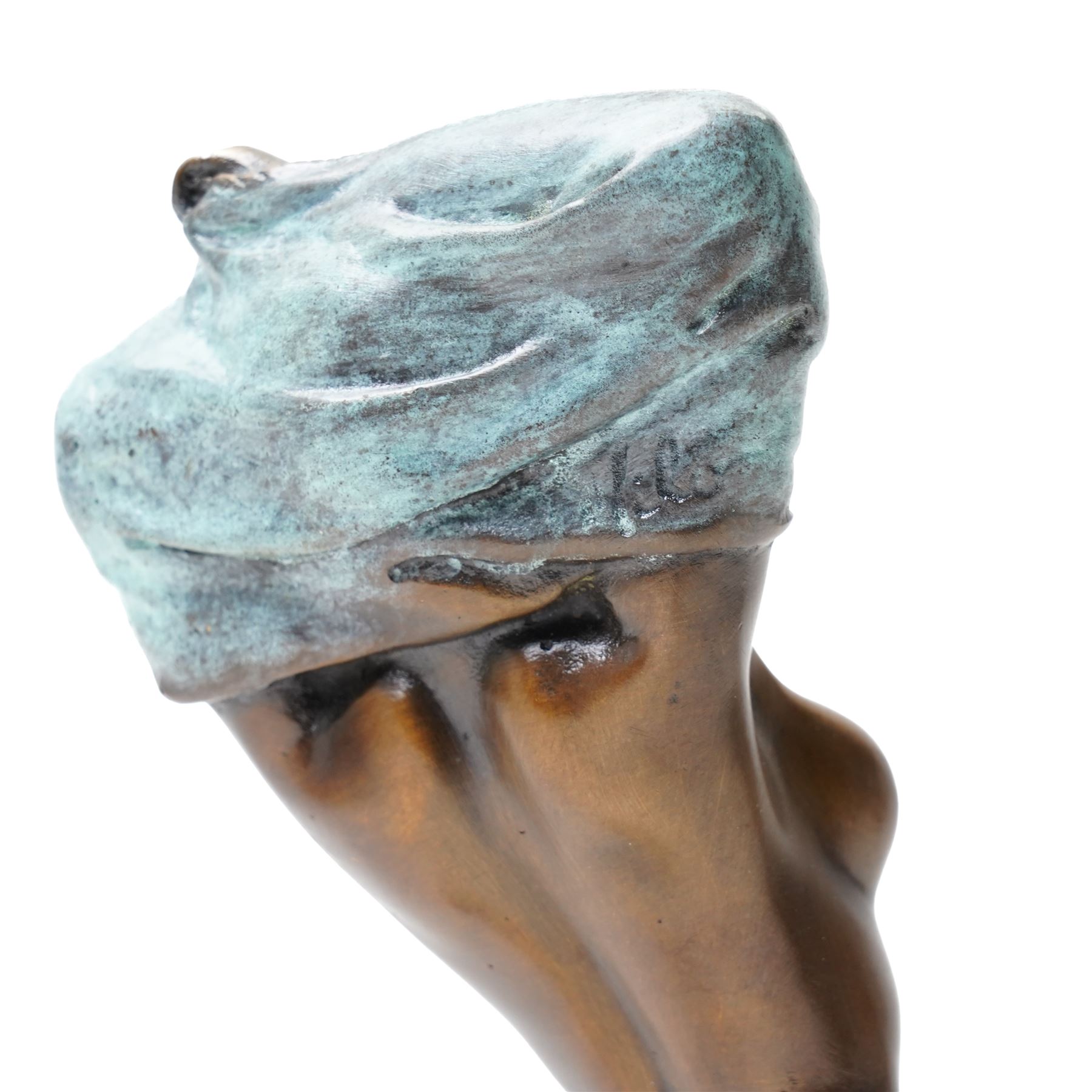 Bronze figure of a kneeling nude removing her shirt, signed 'Milo', H17cm