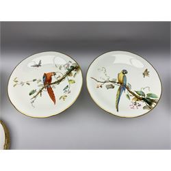 19th century Minton dessert service, comprising four comports, one tazza, and twelve plates, each hand painted with birds perched upon branches, and further detailed with insects and heightened in gilt, with printed retailers mark beneath for John Mortlock Oxford Street London, and impressed Minton mark to most, comport H13.5cm, plates D23.5cm. 
