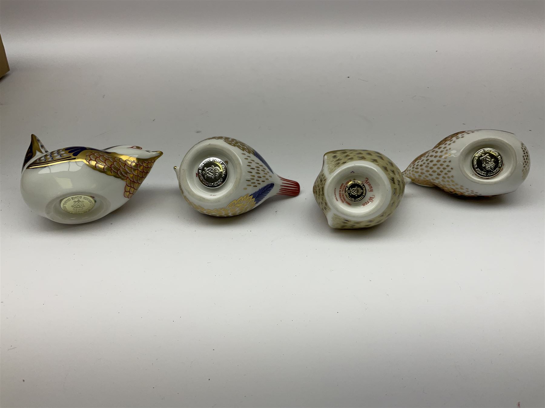 Four Royal Crown Derby paperweights, comprising Wren, Jenny Wren, both